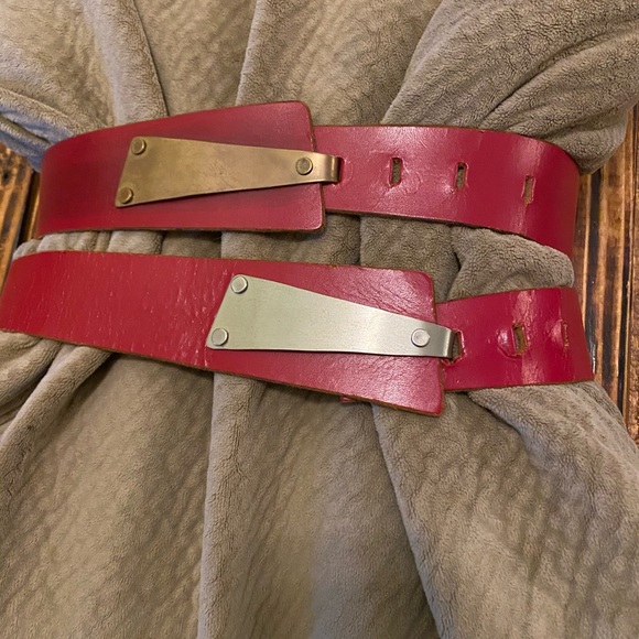Vintage red leather and metal clasps belts